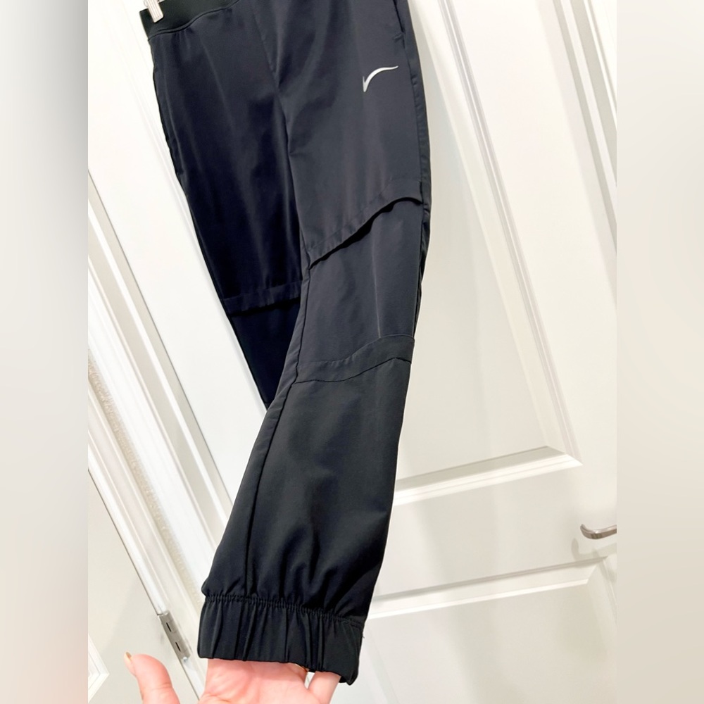 NIKE Women’s Shield Swift Running Pants - Picture 9 of 10